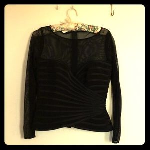 Long sleeve dressy top.